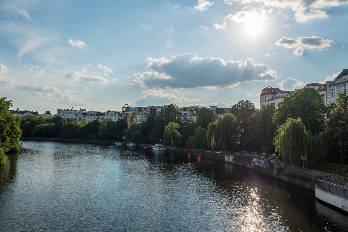 wide stretch of tree-lined river