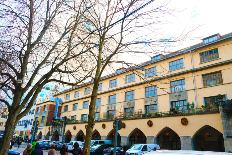 building with holiday wreaths