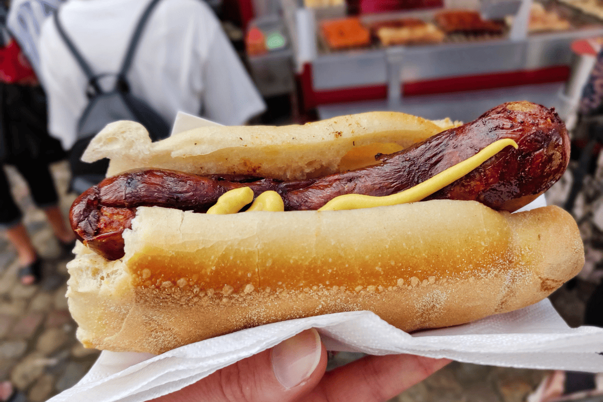 German sausage on bread with mustard